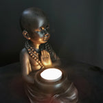 KNEELING MONK TEALIGHT HOLDER